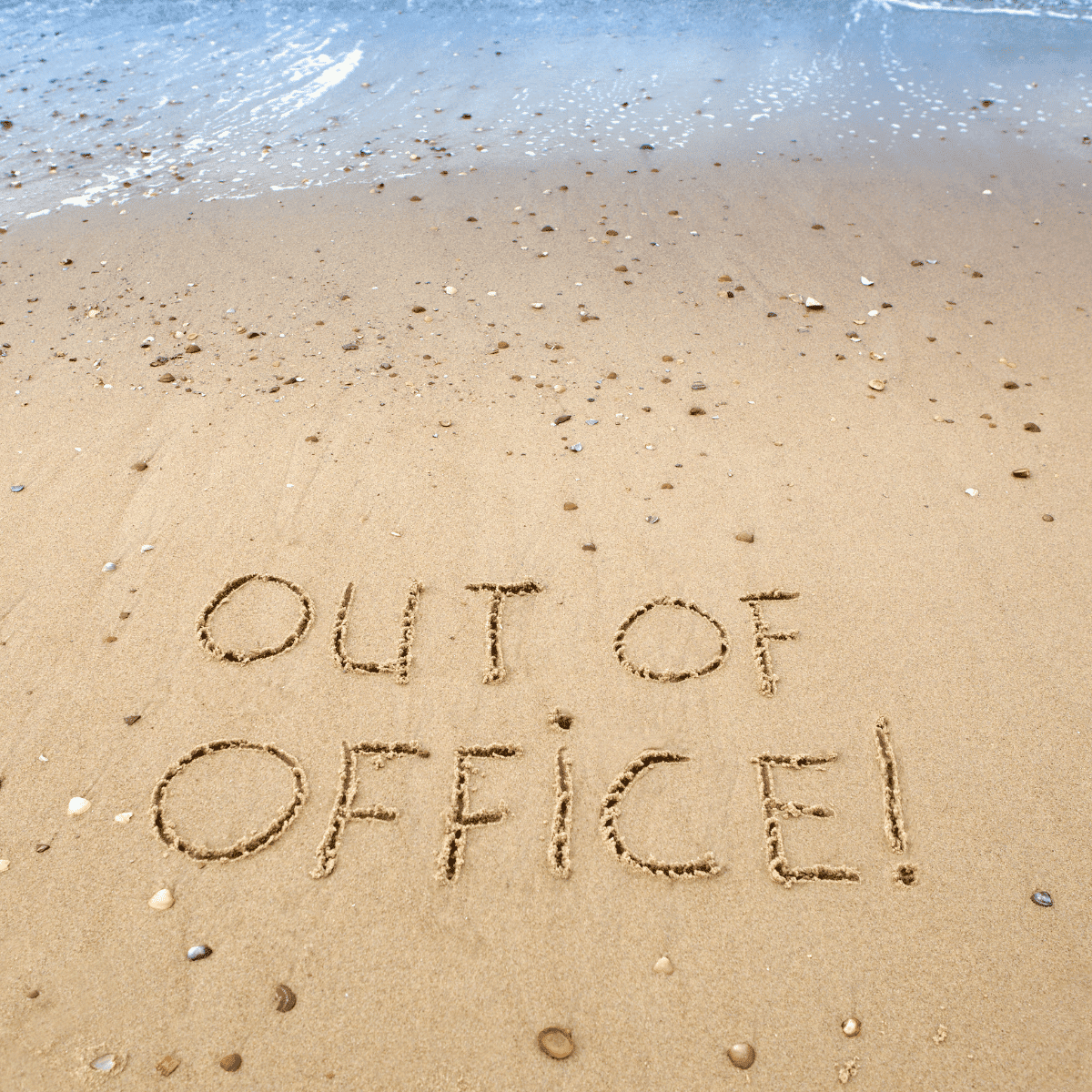 OoO Message written in sandy beach